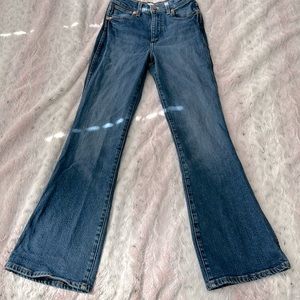 Wrangler, High rise, boot cut blue jeans, size 25.